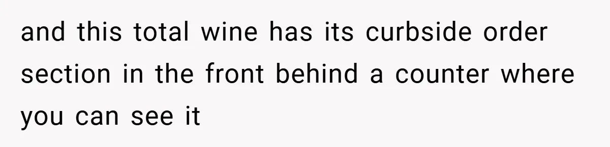 and this total wine has its curbside order section in the front behind a counter where you can see it