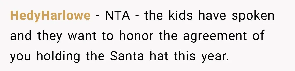 HedyHarlowe − NTA - the kids have spoken and they want to honor the agreement of you holding the Santa hat this year.