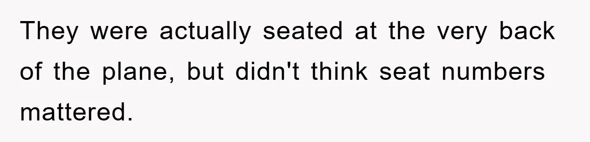They were actually seated at the very back of the plane, but didn't think seat numbers mattered.