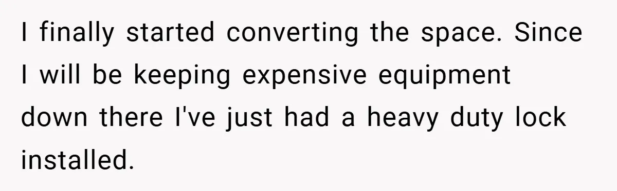 I finally started converting the space. Since I will be keeping expensive equipment down there I've just had a heavy duty lock installed.