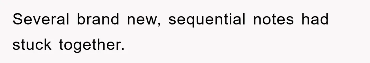 Several brand new, sequential notes had stuck together.