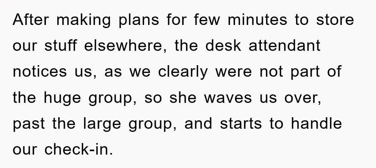 After making plans for few minutes to store our stuff elsewhere, the desk attendant notices us, as we clearly were not part of the huge group, so she waves us...