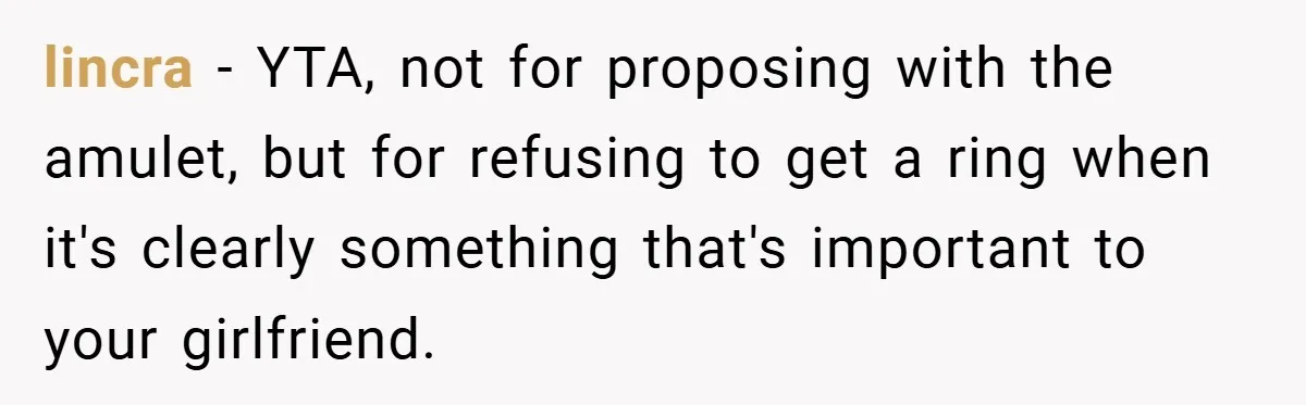 lincra − YTA, not for proposing with the amulet, but for refusing to get a ring when it's clearly something that's important to your girlfriend.