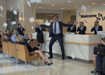 Tall Bank Teller Follows Loud Greeting Demand Exactly, Shocks Entire Lobby, And Secures His Quiet Style