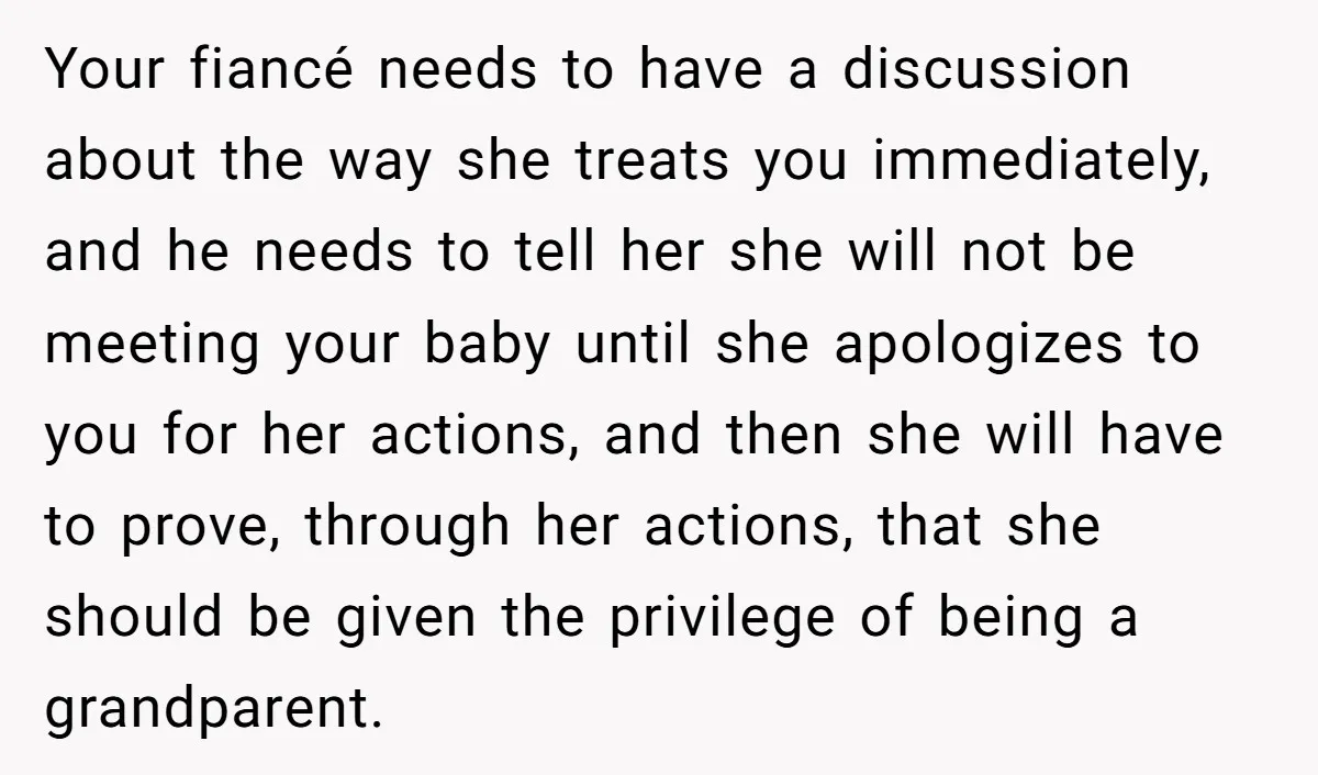 Your fiancé needs to have a discussion about the way she treats you immediately, and he needs to tell her she will not be meeting your baby until she apologizes...