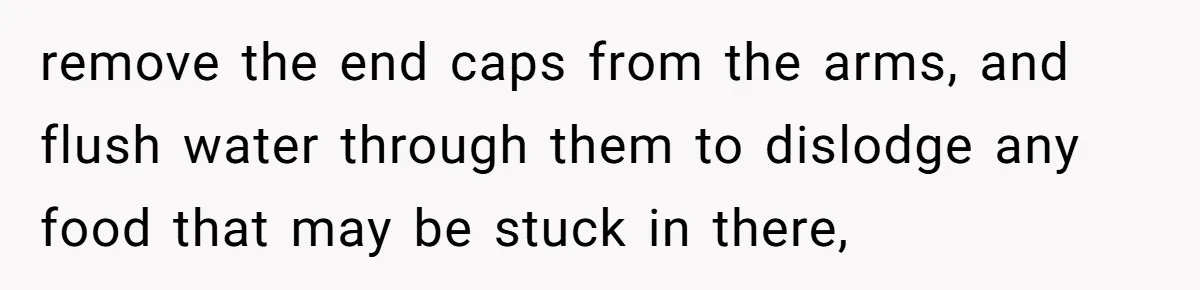 remove the end caps from the arms, and flush water through them to dislodge any food that may be stuck in there,