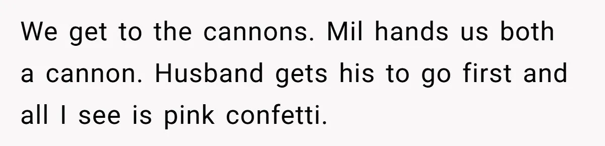 We get to the cannons. Mil hands us both a cannon. Husband gets his to go first and all I see is pink confetti.