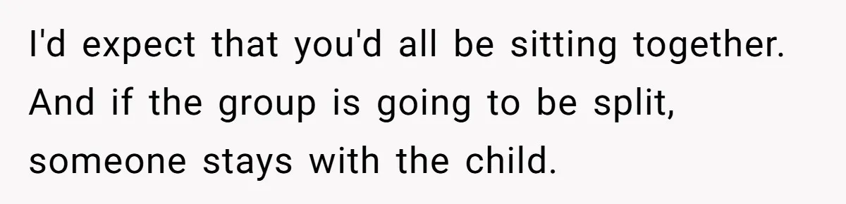 I'd expect that you'd all be sitting together. And if the group is going to be split, someone stays with the child.