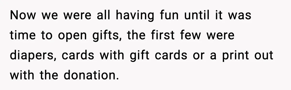 Now we were all having fun until it was time to open gifts, the first few were diapers, cards with gift cards or a print out with the donation.