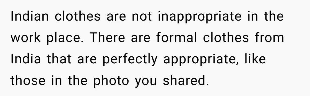 Indian clothes are not inappropriate in the work place. There are formal clothes from India that are perfectly appropriate, like those in the photo you shared.