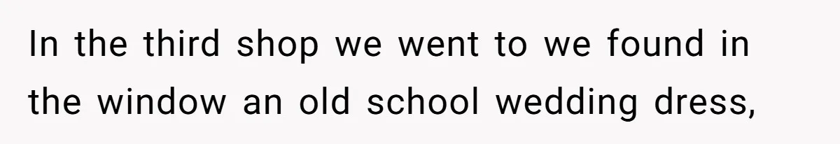 In the third shop we went to we found in the window an old school wedding dress,
