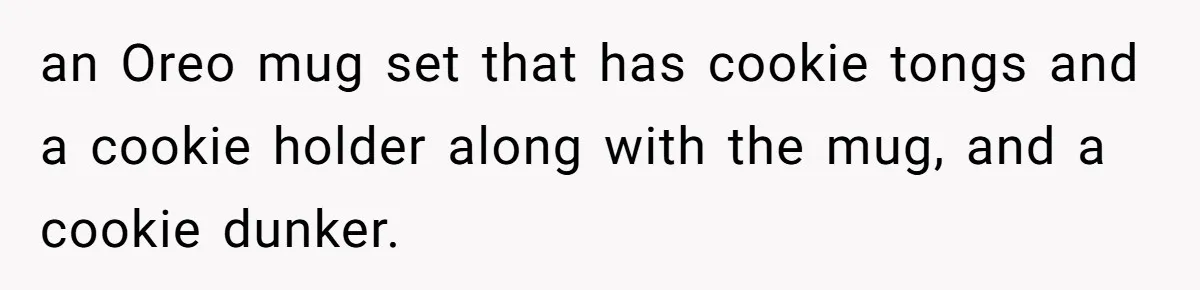 an Oreo mug set that has cookie tongs and a cookie holder along with the mug, and a cookie dunker.