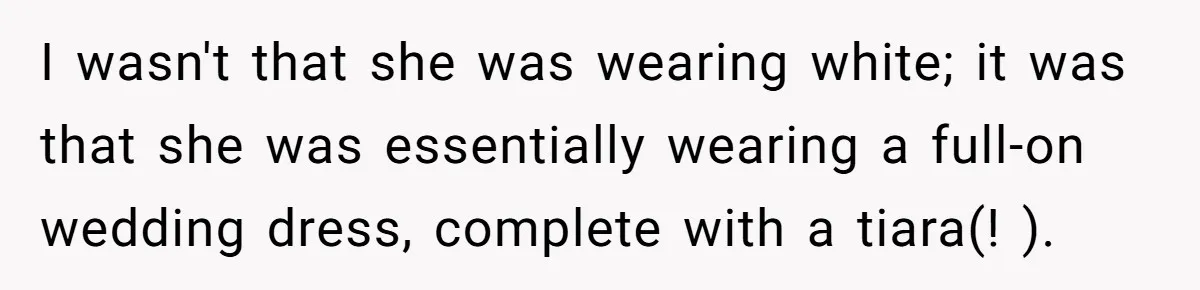 I wasn't that she was wearing white; it was that she was essentially wearing a full-on wedding dress, complete with a tiara(! ).