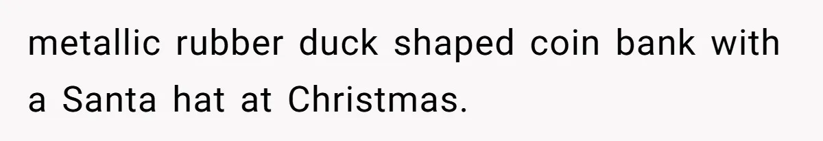 metallic rubber duck shaped coin bank with a Santa hat at Christmas.