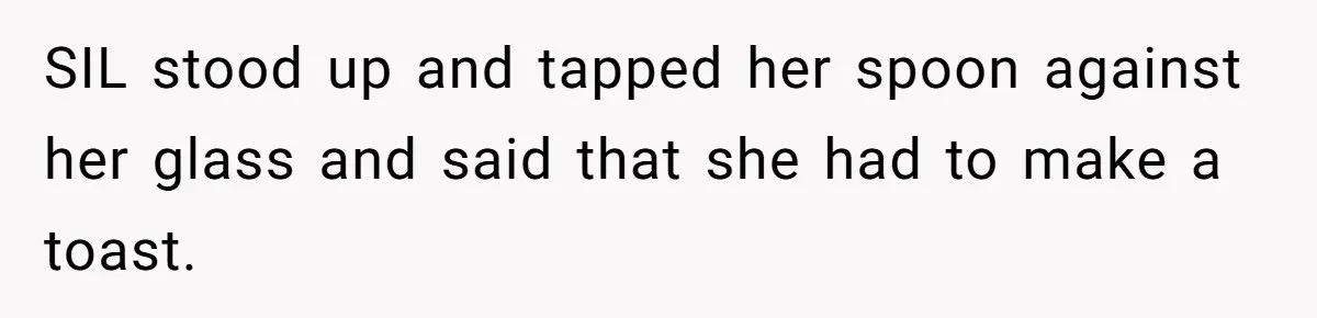 SIL stood up and tapped her spoon against her glass and said that she had to make a toast.