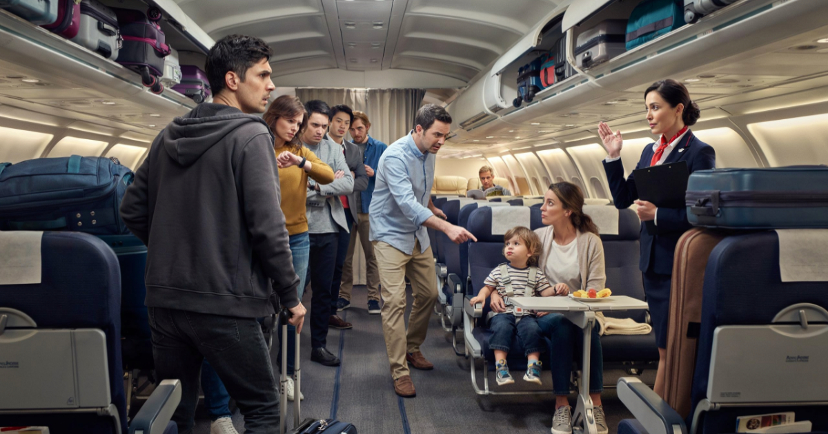 Family Tricks Passenger Into Giving Up Aisle Seat, But Their Business Class Lie Backfires