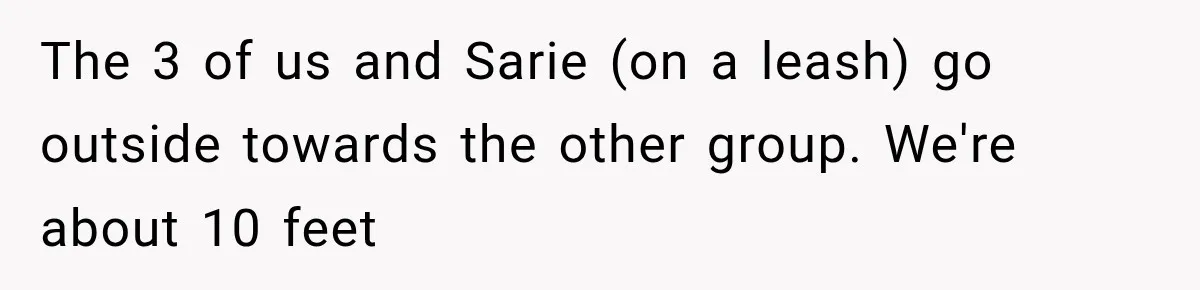 The 3 of us and Sarie (on a leash) go outside towards the other group. We're about 10 feet