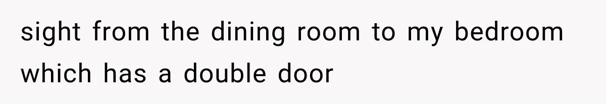 sight from the dining room to my bedroom which has a double door