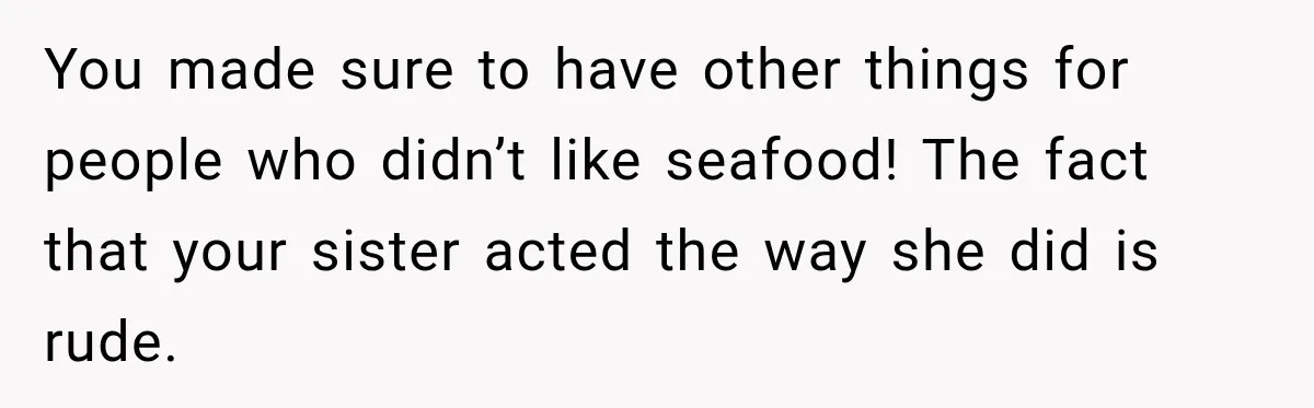 You made sure to have other things for people who didn’t like seafood! The fact that your sister acted the way she did is rude.