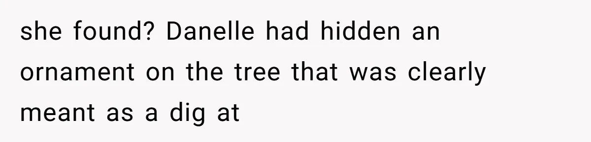she found? Danelle had hidden an ornament on the tree that was clearly meant as a dig at